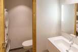 This modern bathroom features a sleek design with a bright, airy feel.