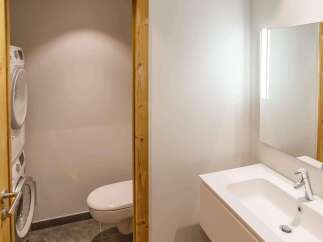 This modern bathroom features a sleek design with a bright, airy feel.
