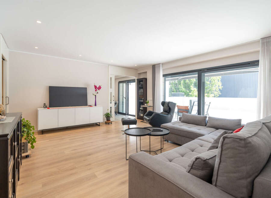 Step into modern elegance with this stunning living space.