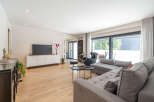 Step into modern elegance with this stunning living space.