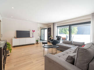 Step into modern elegance with this stunning living space.
