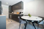 Discover modern living in this stylish kitchen and dining area.