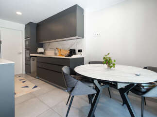 Discover modern living in this stylish kitchen and dining area.