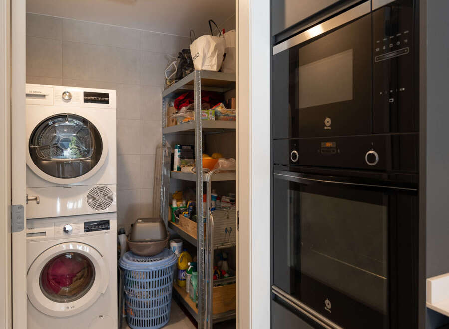 Discover the convenience of this property, featuring a dedicated laundry area with a washer and dryer.