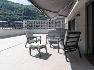 Enjoy breathtaking views from this modern outdoor space, perfect for relaxation and entertaining.