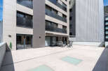 Discover modern living at its finest with this stunning property featuring a spacious outdoor terrace.