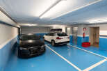 This modern parking garage offers secure and convenient parking for residents.