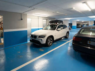 Discover the convenience of secure parking in this well-lit underground garage.