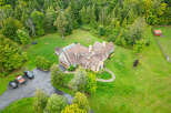 This stunning property boasts a luxurious home with a beautiful pool, perfect for relaxation and entertainment.