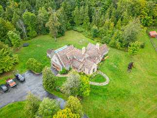 This stunning property boasts a luxurious home with a beautiful pool, perfect for relaxation and entertainment.