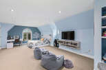 This stunning bedroom boasts a modern design with a touch of elegance.