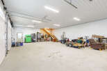 This spacious garage offers ample room for storage and projects.