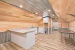 Discover the charm of this unique property featuring a stylish kitchen area with modern countertops and cabinetry.