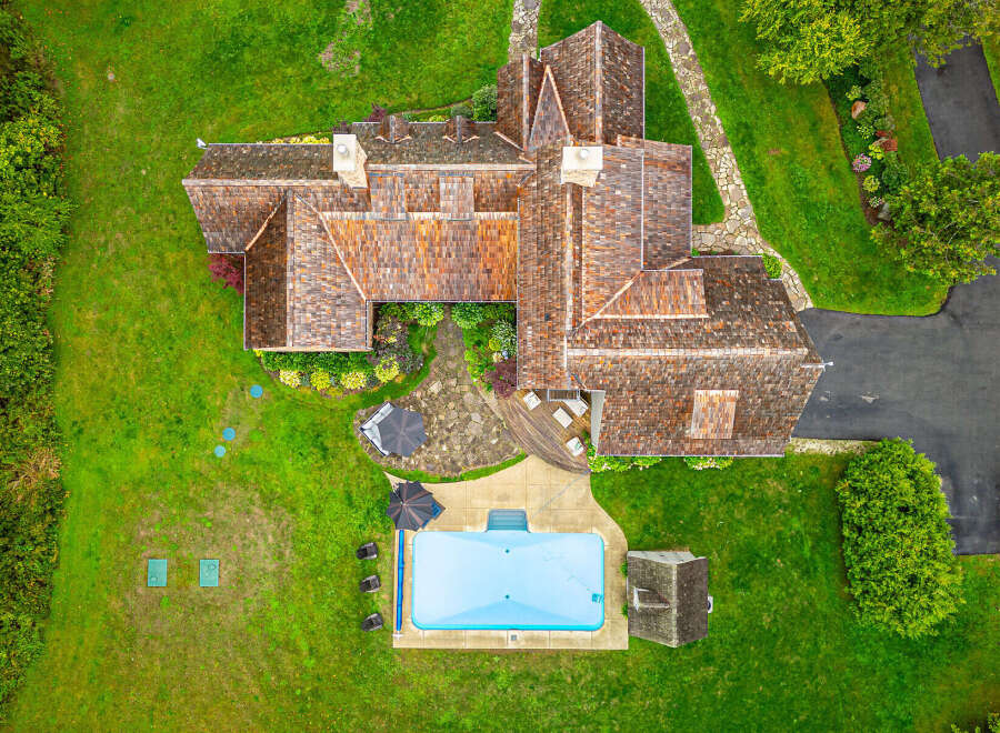 This stunning property boasts a luxurious outdoor oasis, perfect for relaxation and entertainment.