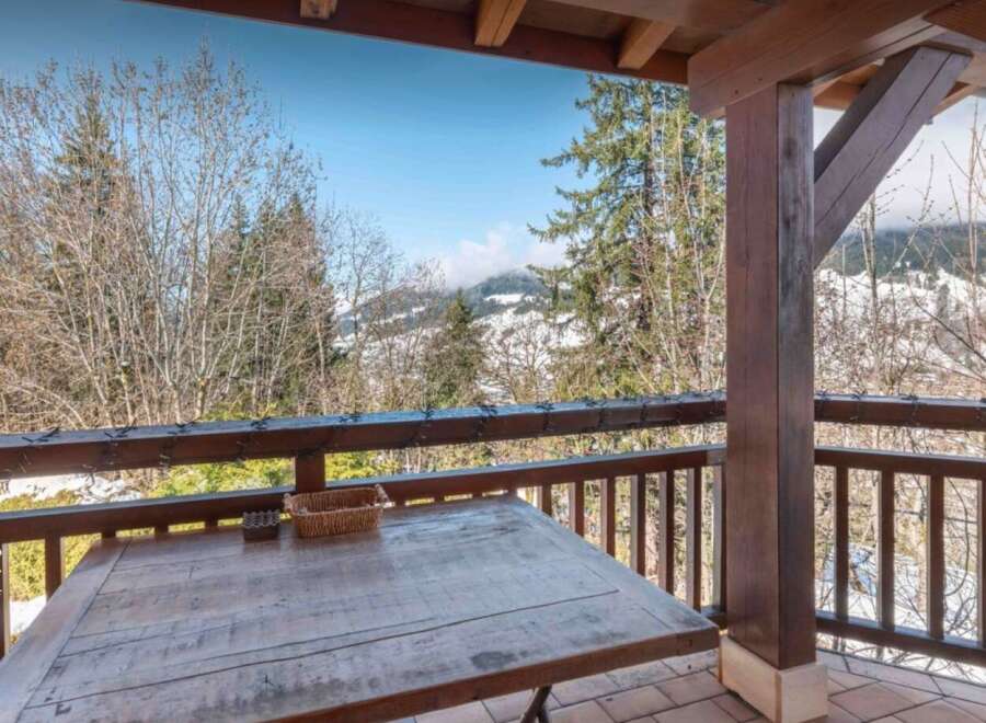 Enjoy breathtaking mountain views from this charming property.