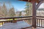 Enjoy breathtaking mountain views from this charming property.