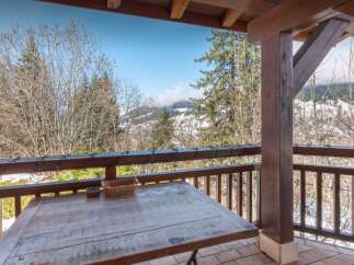 Enjoy breathtaking mountain views from this charming property.