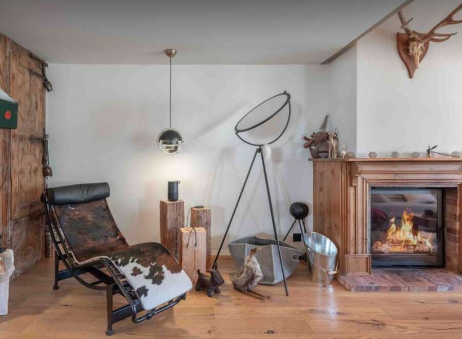 Step into luxury with this stunning property, featuring a cozy fireplace perfect for chilly evenings.