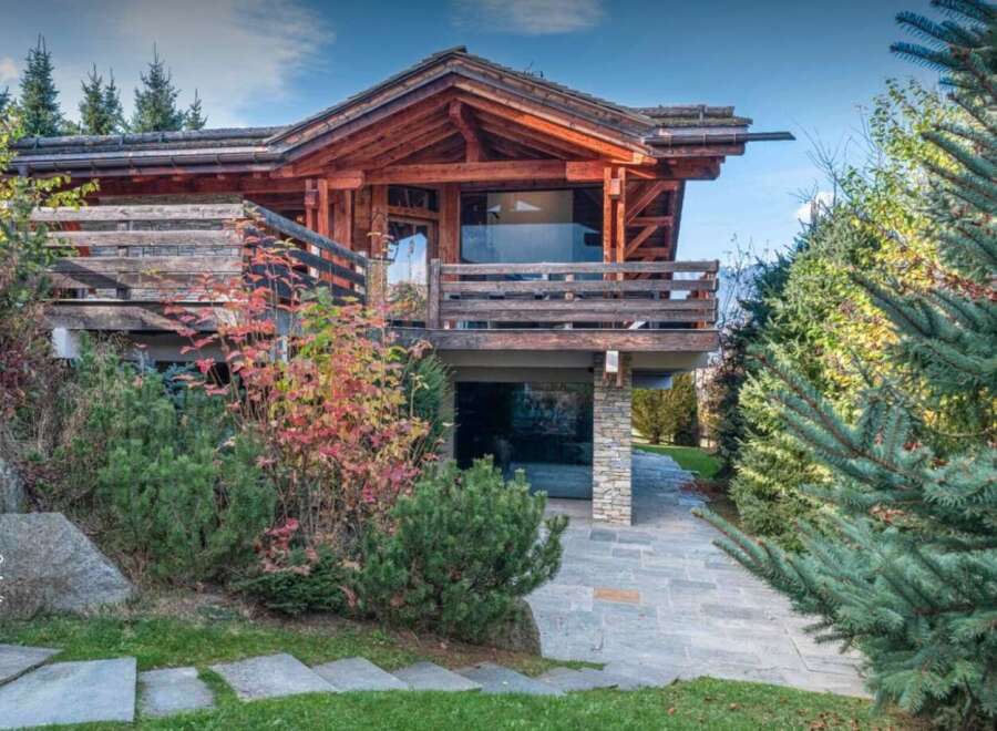 This stunning wooden chalet offers a perfect blend of rustic charm and modern elegance.