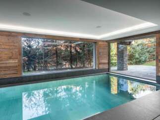 Experience luxury and tranquility in this stunning indoor pool.
