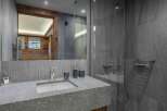 Experience luxury in this stunning bathroom featuring a sleek, modern design.