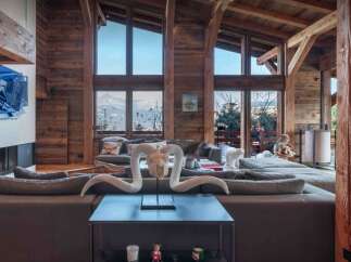 Experience the epitome of luxury living in this stunning chalet, boasting breathtaking mountain views.