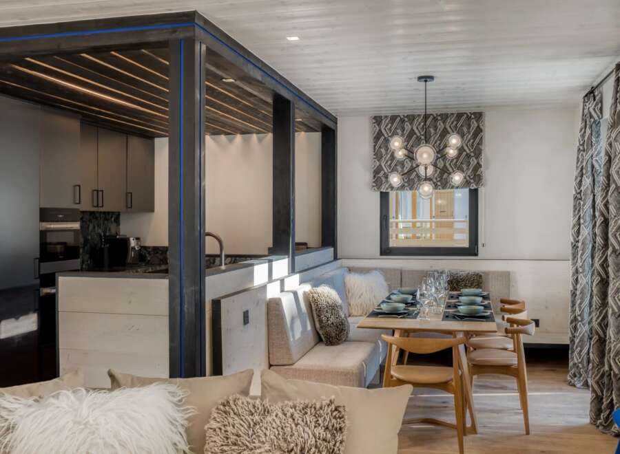 Experience modern luxury in this stunning property, featuring a beautifully designed kitchen and dining area.