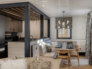 Experience modern luxury in this stunning property, featuring a beautifully designed kitchen and dining area.