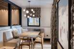 Step into this inviting dining area, perfect for intimate gatherings.