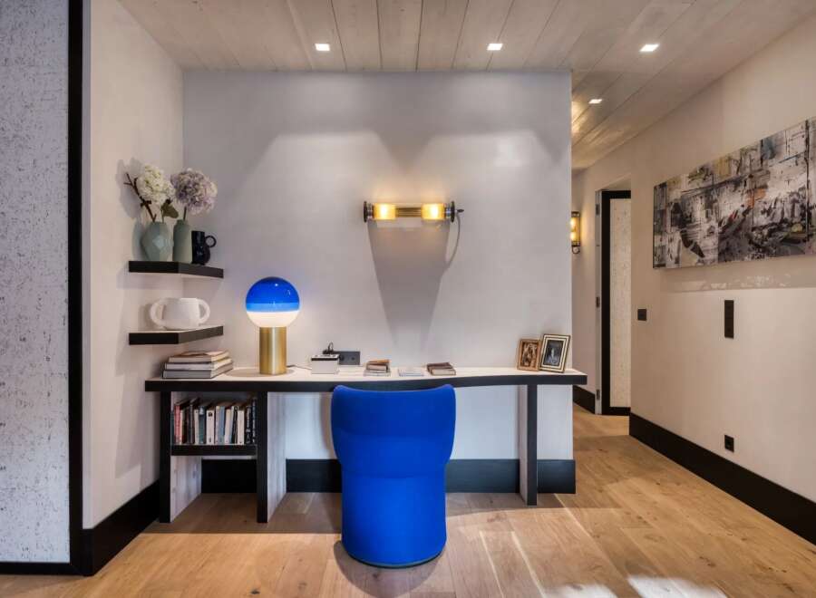 This stunning property boasts a modern interior design with a focus on clean lines and natural light.