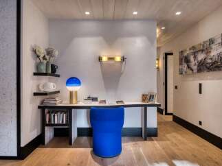 This stunning property boasts a modern interior design with a focus on clean lines and natural light.