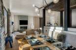 Experience luxury living in this stunning property, featuring a modern open-plan design perfect for entertaining.