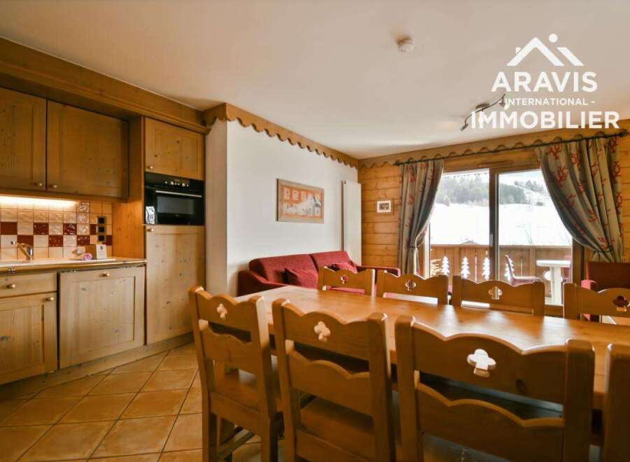 Discover the charm of this inviting property, featuring a cozy dining area perfect for gatherings.