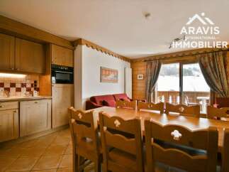 Discover the charm of this inviting property, featuring a cozy dining area perfect for gatherings.