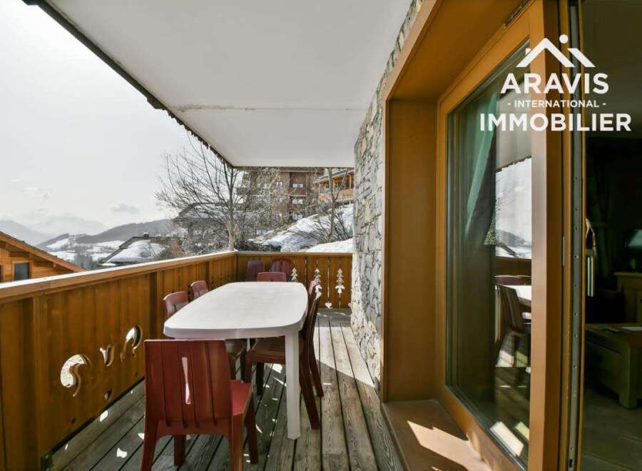 Enjoy breathtaking mountain views from this charming balcony.