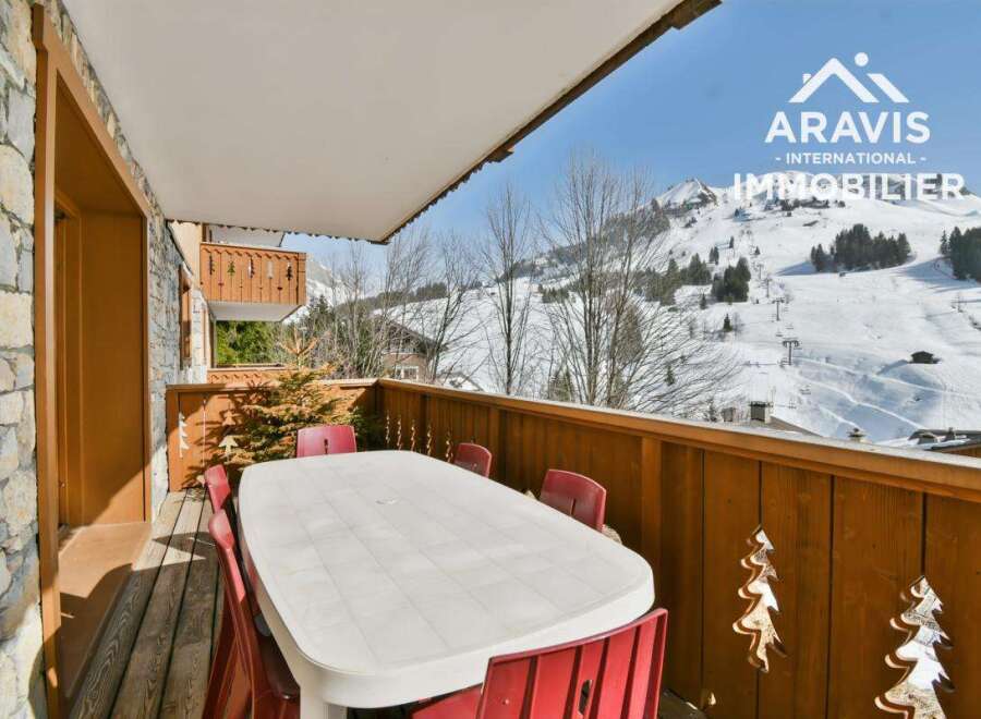 Enjoy breathtaking mountain views from this charming balcony.