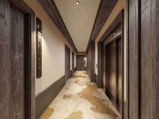 Step into luxury with this stunning hotel hallway.