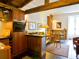 This charming property boasts a beautifully designed kitchen with modern appliances and ample storage.
