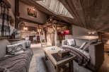 Experience the charm of this cozy chalet-style living space, perfect for a mountain retreat.