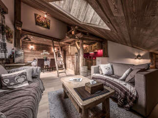 Experience the charm of this cozy chalet-style living space, perfect for a mountain retreat.