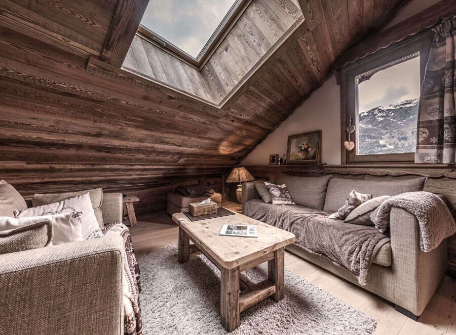 Step into a cozy mountain retreat with this stunning living space.