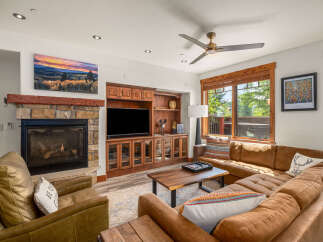 This stunning living room features a cozy fireplace, perfect for chilly evenings.