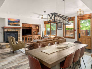 Experience luxury living in this stunning property featuring a cozy fireplace, perfect for chilly evenings.