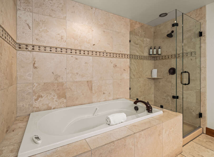 Indulge in luxury with this stunning bathroom featuring a sleek, modern design.