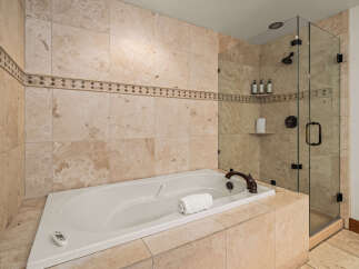Indulge in luxury with this stunning bathroom featuring a sleek, modern design.