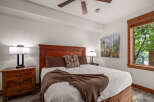 This inviting bedroom boasts a warm and inviting ambiance, perfect for relaxation.