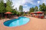 Enjoy a relaxing day at this beautiful outdoor pool, perfect for unwinding and soaking up the sun.