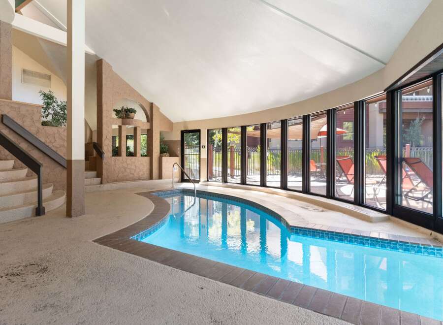 Discover luxury living with this stunning indoor pool.