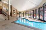 Discover luxury living with this stunning indoor pool.