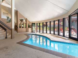 Discover luxury living with this stunning indoor pool.